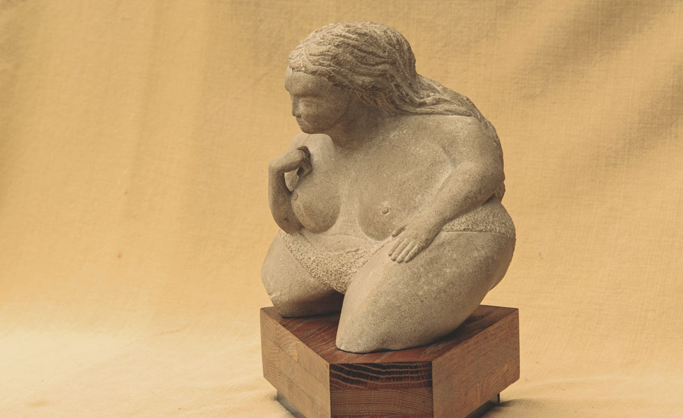 Fat Lady carved stone sculpture