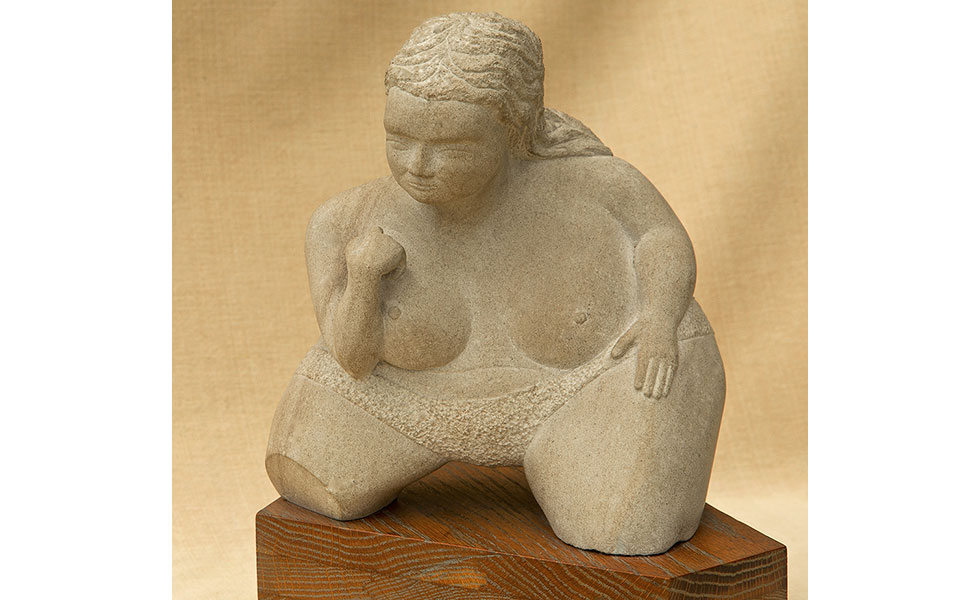 Fat Lady carved limestone sculpture